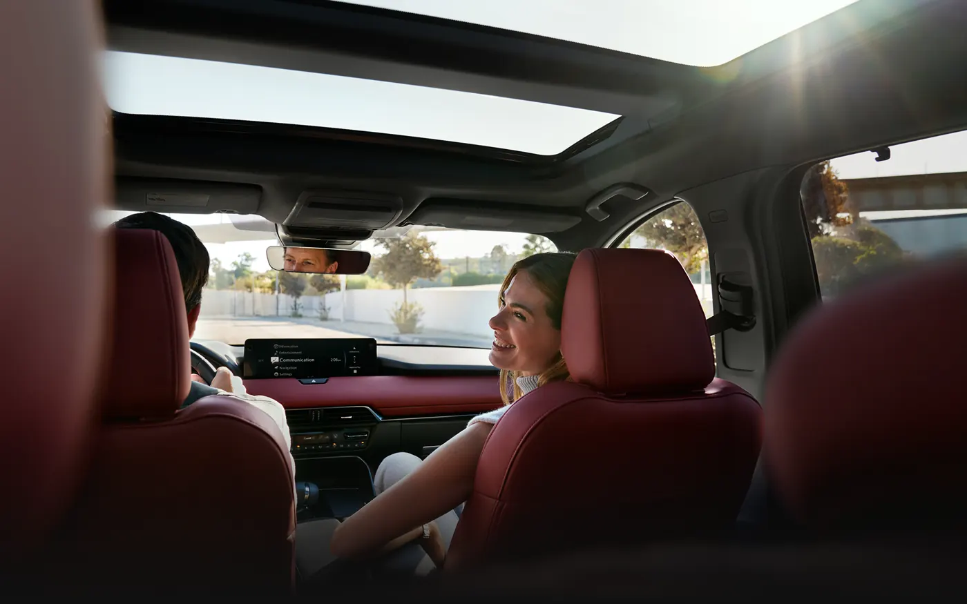 Friends riding in the 2-row 2027 Mazda CX-90 | DELLA Mazda in Queensbury NY